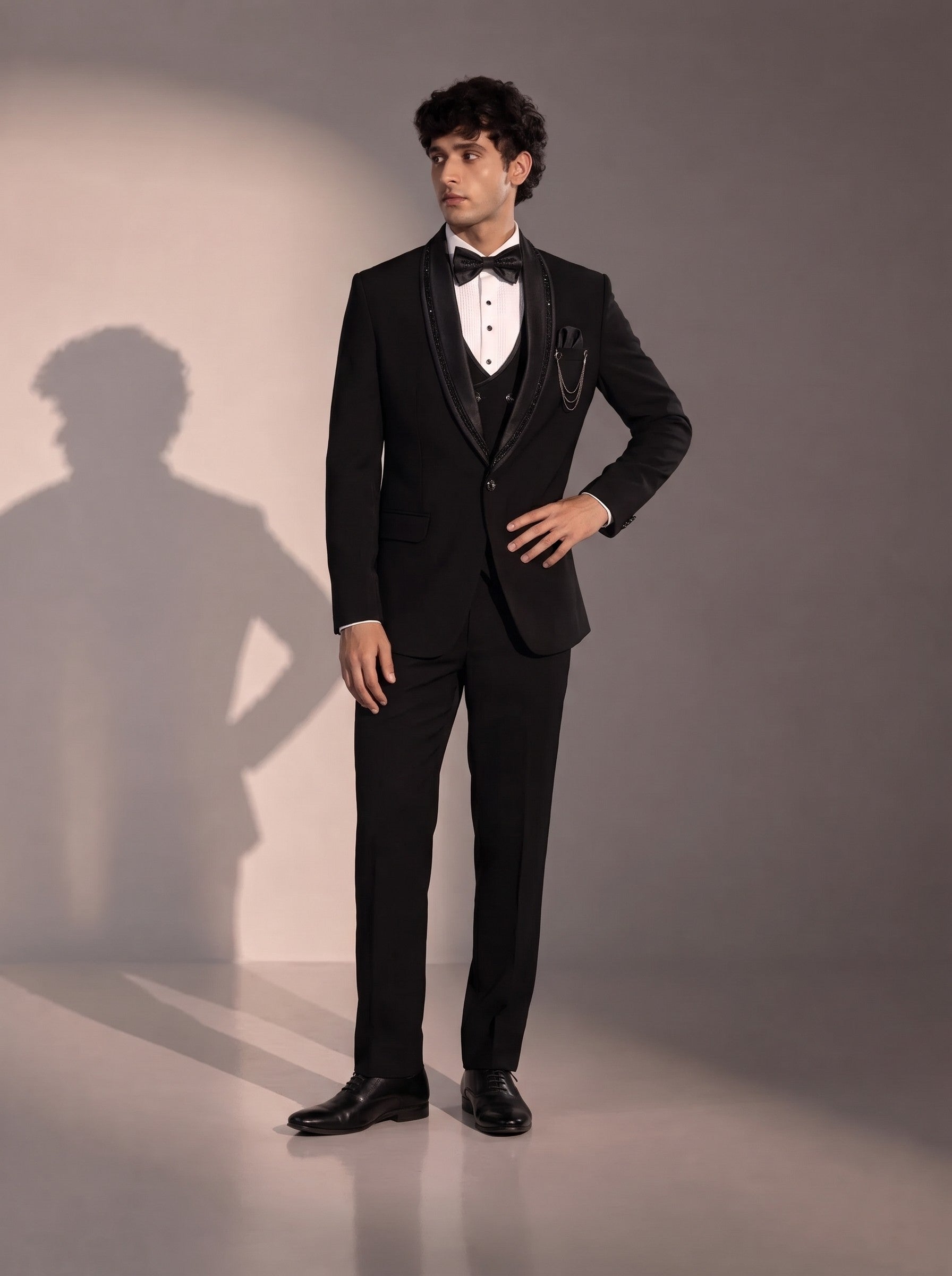 Black crystal trim tuxedo suit for men - front view