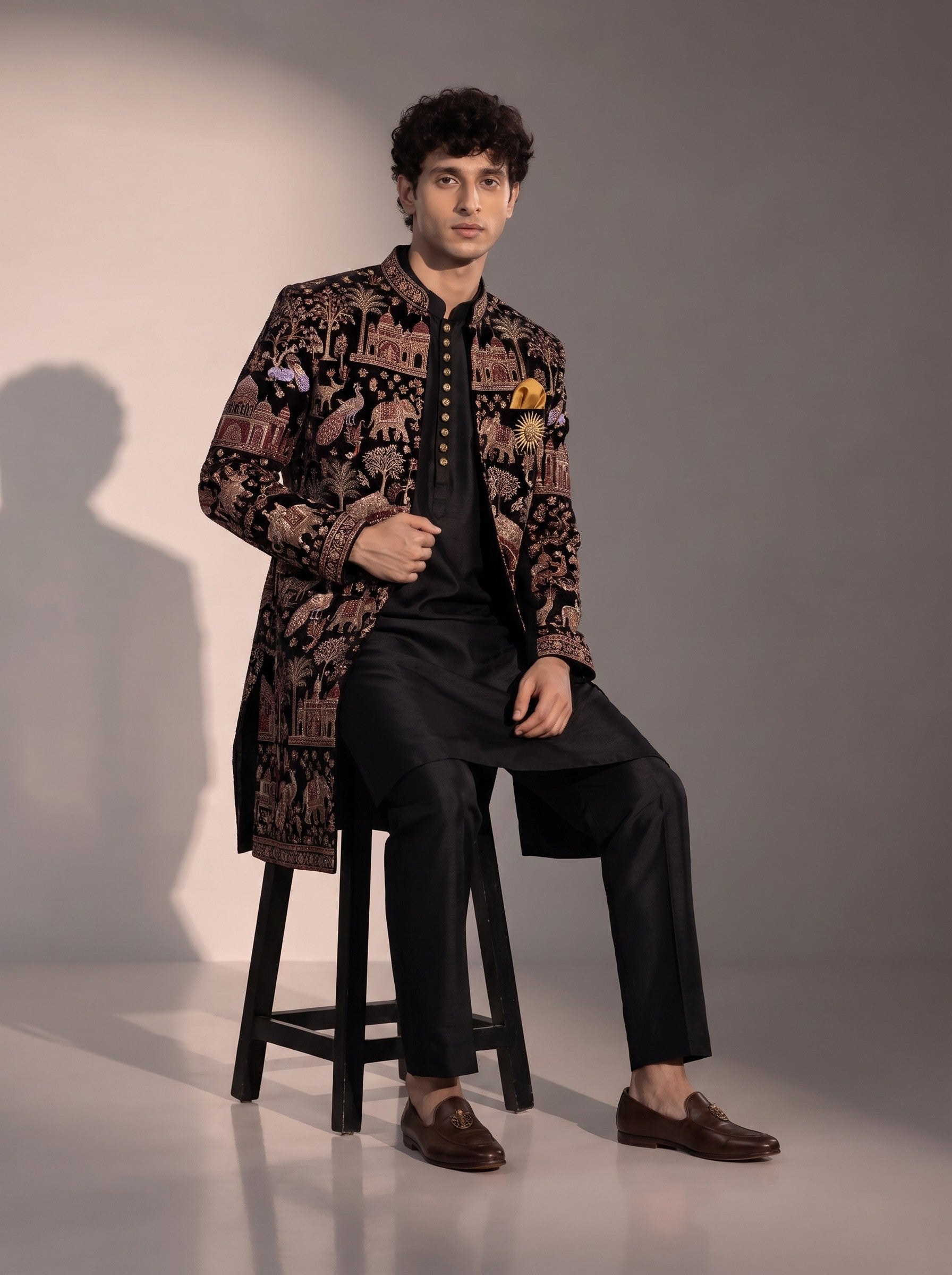 Black multicolour heritage embroidered silk indowestern for men - seated pose