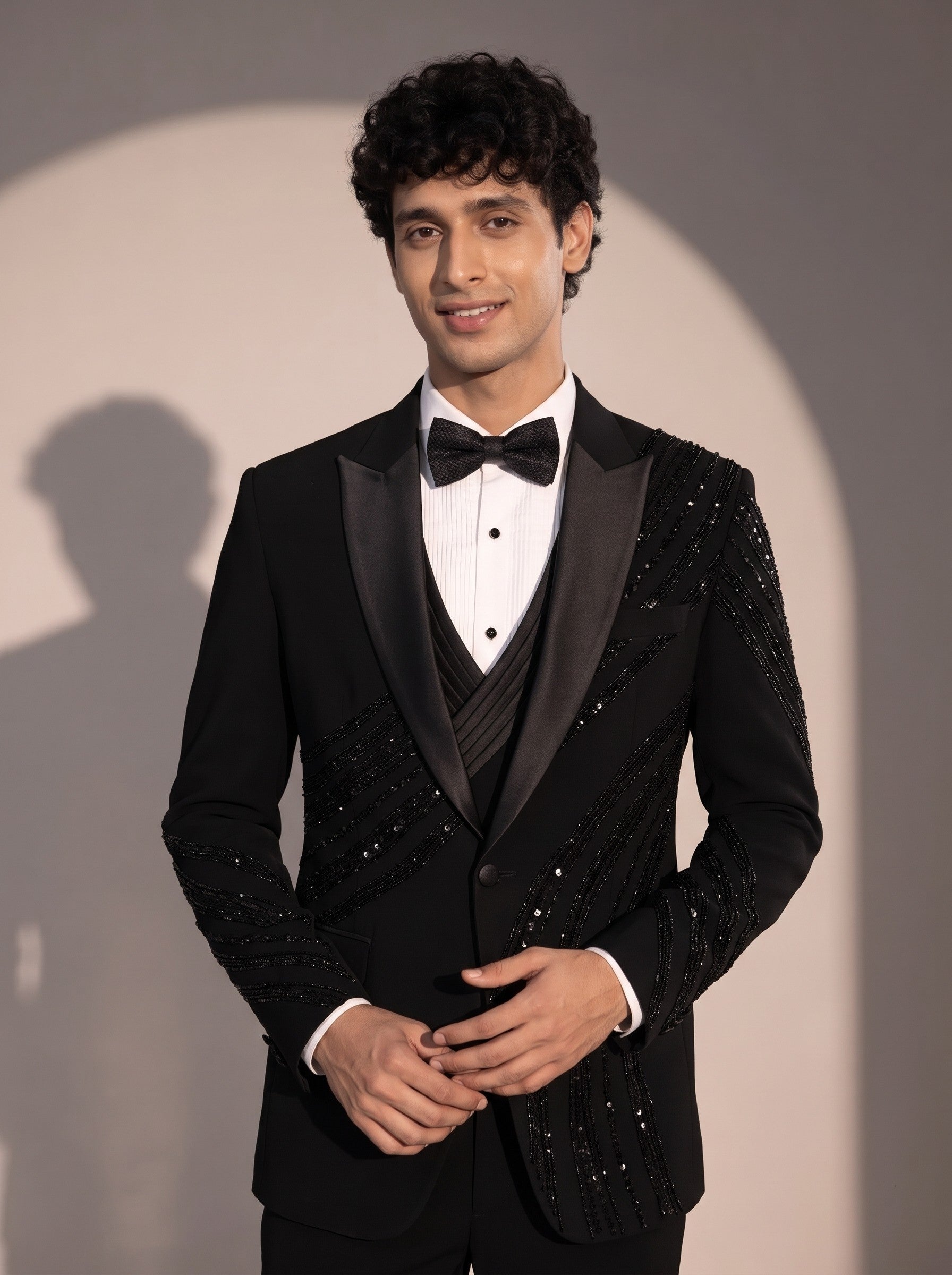 Black peak lapel beaded tuxedo suit for men - close-up of lapel and detailing