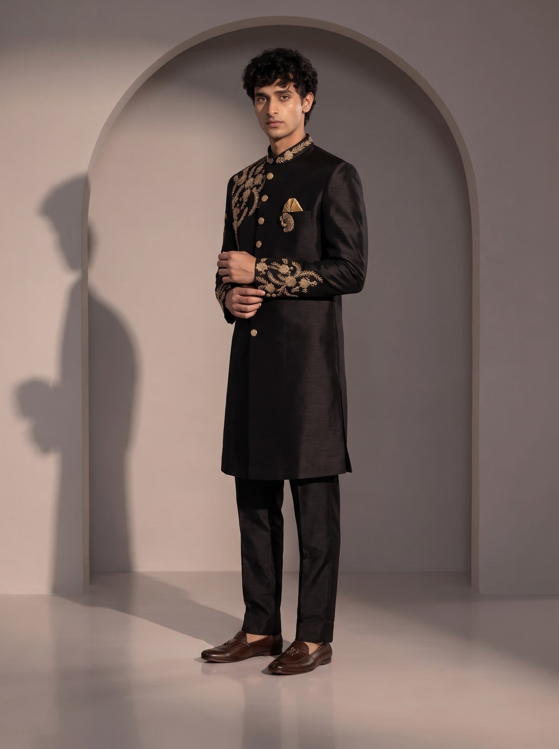 Black silk indowestern for men - side view showing gold embroidered sleeve