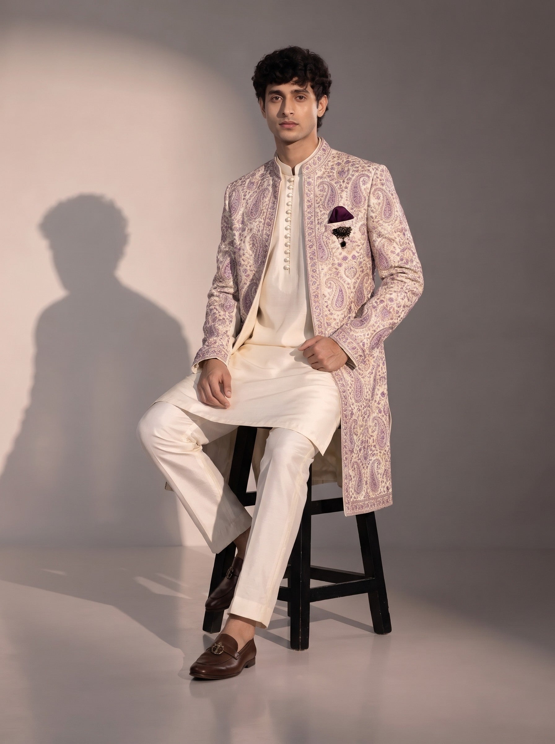 Lavender paisley embroidered silk indowestern for men - seated pose