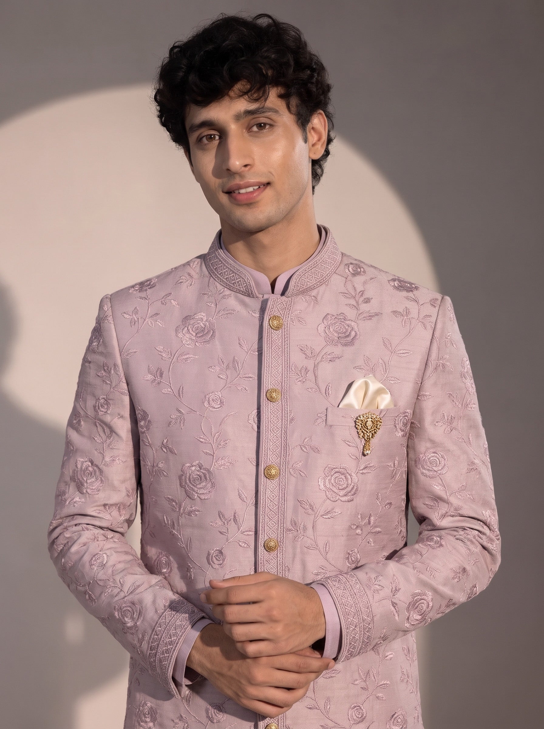 Light purple indowestern close-up showing floral embroidery, mandarin collar and gold buttons