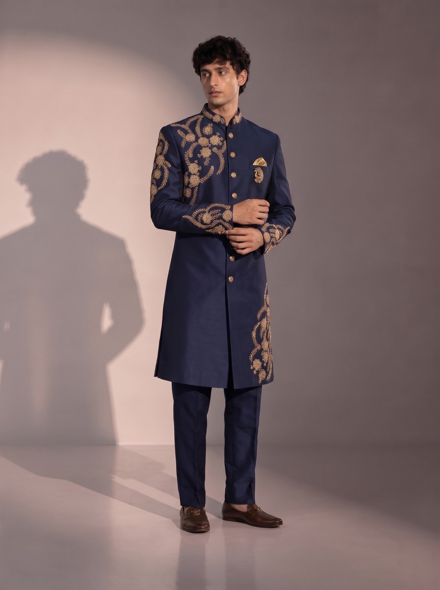 Navy blue silk indowestern for men - side view with gold embroidered cuffs