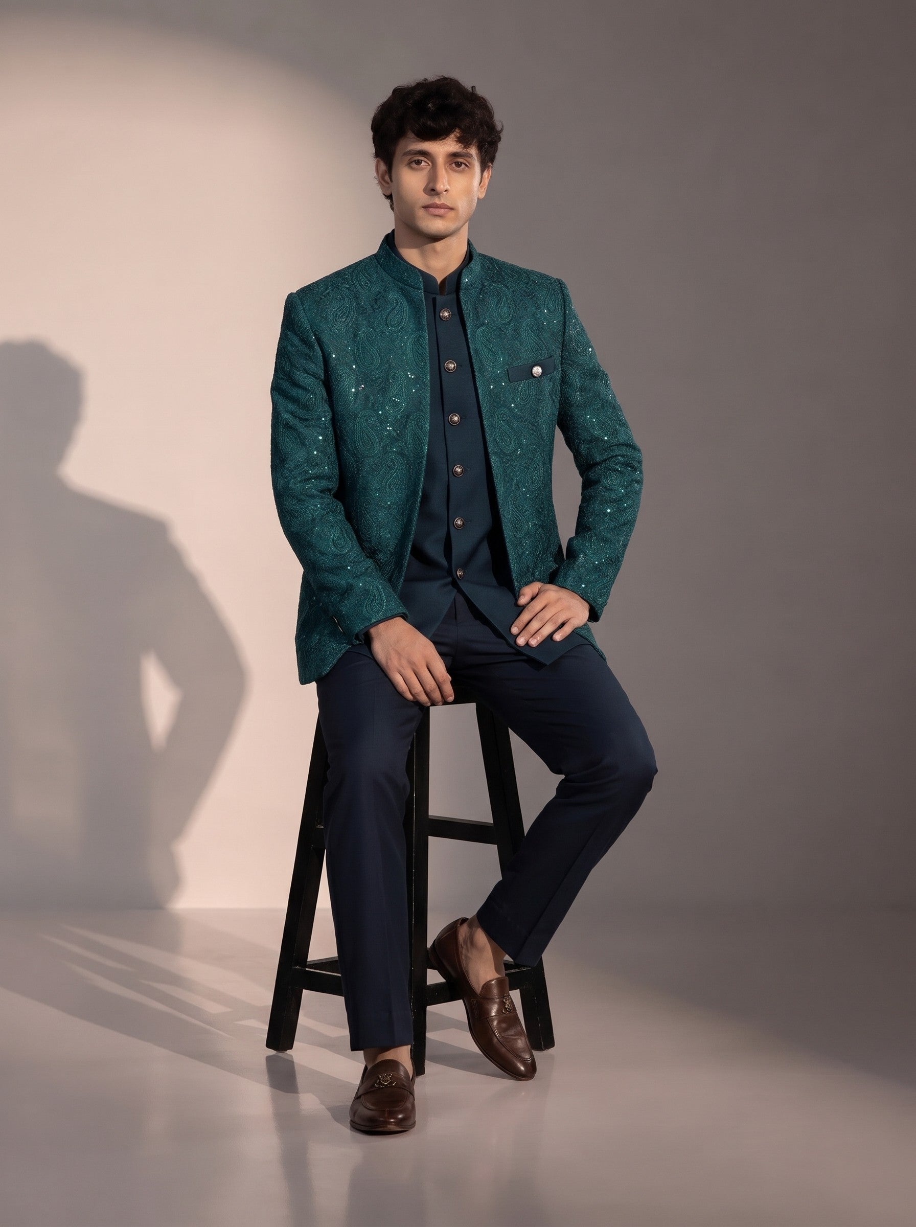 Rama green paisley jodhpuri indowestern suit for men - seated pose
