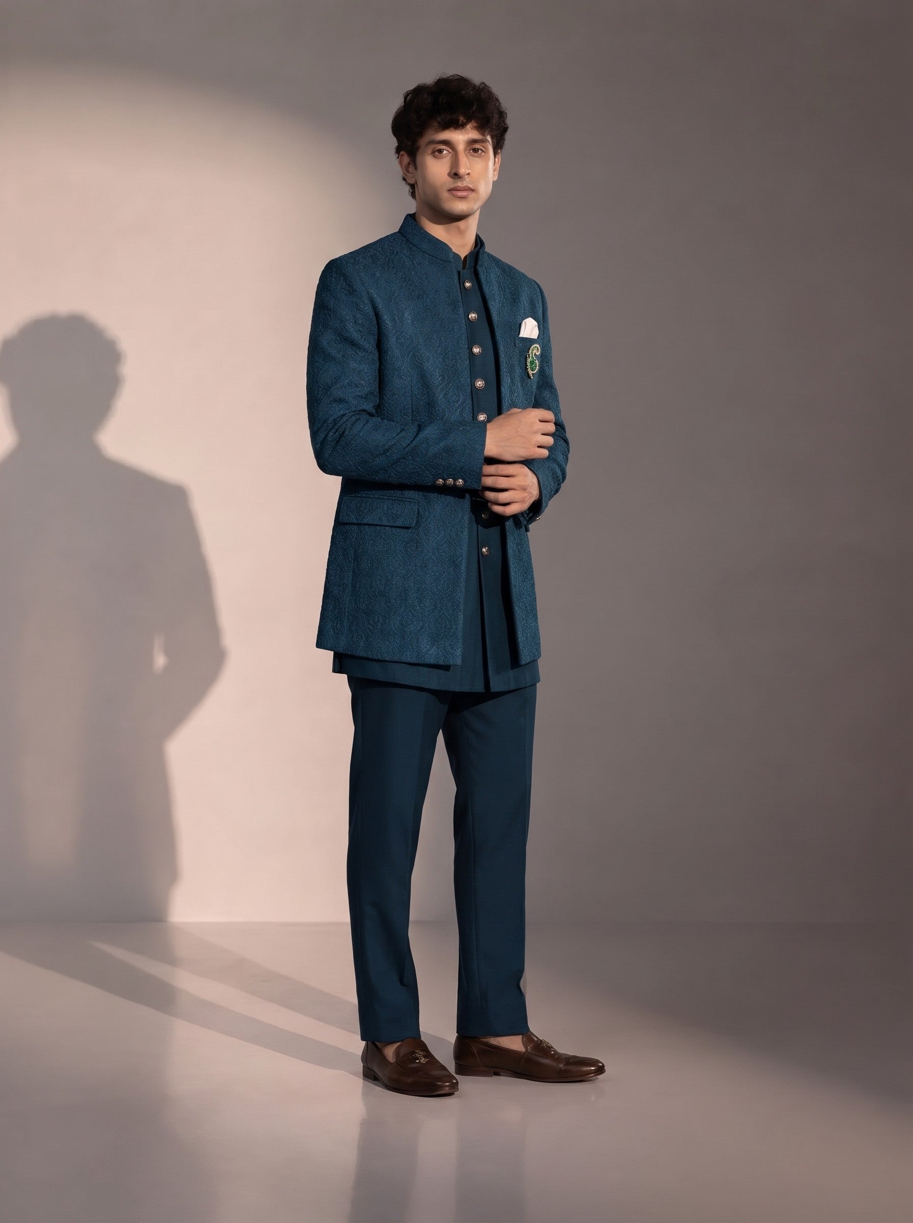 Teal blue textured jodhpuri indowestern suit for men - three-quarter view